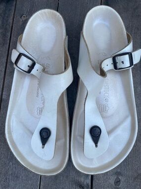 Birkenstock metallic White Thong Sandals with Black Buckles